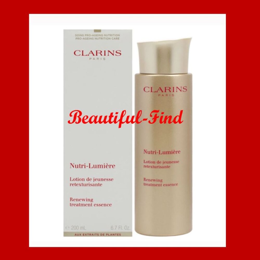 Clarins nutri-lumiere renewing treatment essence lotion 6.7 oz NIB